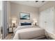 Cozy bedroom with neutral walls, comfortable bedding, and a wardrobe at 1118 Franklin Tree Ln, Sanford, FL 32771