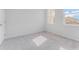 Sunlit bedroom with two windows and neutral carpeting at 1211 Normandy Dr, Haines City, FL 33844