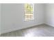 Bright bedroom with natural light showcases the neutral color palette at 13 Oak Trail Pl, Ocala, FL 34472