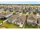 An aerial view of a community with nicely manicured lawns at 1580 Eucalyptus Way, Davenport, FL 33837