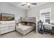 bedroom with a bunk bed, a workspace, and filled with toys at 1580 Eucalyptus Way, Davenport, FL 33837