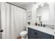 Elegant bathroom features a marble countertop vanity and modern fixtures at 1624 Malcolm Pointe Dr, Winter Garden, FL 34787