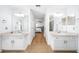 Bright bathroom featuring double sinks, modern lighting, and tile floors at 1624 Malcolm Pointe Dr, Winter Garden, FL 34787