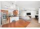 Open living space featuring a seamless flow between the kitchen, dining, and living areas at 1624 Malcolm Pointe Dr, Winter Garden, FL 34787