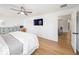 Spacious main bedroom with ceiling fan, en-suite and work space at 1624 Malcolm Pointe Dr, Winter Garden, FL 34787