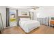 Comfortable main bedroom features a queen size bed and exterior views at 1624 Malcolm Pointe Dr, Winter Garden, FL 34787