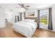 Bright main bedroom with natural light and a neutral color palette at 1624 Malcolm Pointe Dr, Winter Garden, FL 34787