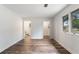 Spacious bedroom featuring doors to the bathroom and closet with modern flooring and natural light at 16336 Old Cheney Hwy, Orlando, FL 32833