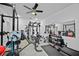 Home gym offering various machines for strength training, enhancing a healthy lifestyle at 1802 Candlenut Cir, Apopka, FL 32712