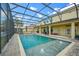 Large screened pool with fountains, perfect for relaxation and outdoor entertaining at 1802 Candlenut Cir, Apopka, FL 32712