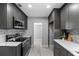 Contemporary kitchen showcasing stainless steel appliances and stylish finishes at 1900 E Orange Ave, Eustis, FL 32726