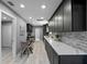 Modern kitchen boasting sleek cabinetry, countertops, and stainless steel appliances at 1900 E Orange Ave, Eustis, FL 32726