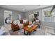 Cozy living room with comfortable furniture, open to the kitchen and dining area at 1900 E Orange Ave, Eustis, FL 32726