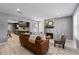 Open-concept living space with a fireplace, seamlessly connecting to the kitchen area at 1900 E Orange Ave, Eustis, FL 32726
