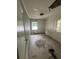 Empty bedroom with damaged floors and peeling ceiling paint, ready for renovation and personalization at 1905 S Westmoreland Dr, Orlando, FL 32805