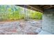 Spacious backyard featuring a partially wooded area, providing privacy and natural beauty at 2132 Pine Meadows Golf Course Rd, Eustis, FL 32726