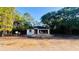 New construction home with block walls, a new roof, and a two-car garage at 2132 Pine Meadows Golf Course Rd, Eustis, FL 32726