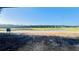 Scenic view of a large lot with a pond and lush greenery surrounding the property at 2132 Pine Meadows Golf Course Rd, Eustis, FL 32726