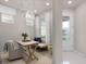 Cozy flex room with a decorative light fixture and a view of the front door at 2334 Lily Bloom Rd, St Cloud, FL 34771