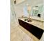 The kitchen features granite counters, tile floors and stainless steel sink at 238 Riverbend Dr # 105, Altamonte Springs, FL 32714