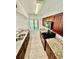 Updated kitchen boasts granite countertops, modern appliances, and ample cabinet space at 238 Riverbend Dr # 105, Altamonte Springs, FL 32714