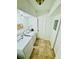 A practical laundry room featuring a washer, dryer and built-in shelving at 238 Riverbend Dr # 105, Altamonte Springs, FL 32714