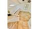 Open loft with wood floors and staircase overlooks living space below at 238 Riverbend Dr # 105, Altamonte Springs, FL 32714