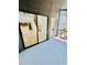 Exterior of the home with view through sliding glass doors of the interior living area and staircase at 238 Riverbend Dr # 105, Altamonte Springs, FL 32714