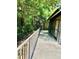 A relaxing outdoor patio area with a railing, perfect for enjoying the serene surroundings at 238 Riverbend Dr # 105, Altamonte Springs, FL 32714