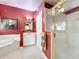 Bathroom featuring a soaking tub, glass shower, and vanity with sink at 2409 Twickingham Ct, Clermont, FL 34711