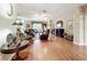 Spacious living room with hardwood floors and ample natural light at 2409 Twickingham Ct, Clermont, FL 34711