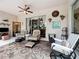Charming patio with comfortable seating, perfect for enjoying the outdoors in relaxation and style at 2409 Twickingham Ct, Clermont, FL 34711