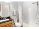 Bathroom with modern vanity, toilet, and tub/shower with curtain at 2789 Southland St, St Cloud, FL 34772