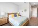 Bedroom with neutral decor, wooden furniture, and a comfortable, inviting space at 2789 Southland St, St Cloud, FL 34772