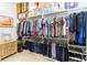 Walk-in closet with clothing racks, shelving, cabinets, and a curated, organized space at 2789 Southland St, St Cloud, FL 34772