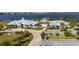 A beautiful view of the community entrance, clubhouse, and parking at 2789 Southland St, St Cloud, FL 34772
