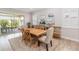 Bright dining room with wood floors and views of the outdoor patio at 2789 Southland St, St Cloud, FL 34772