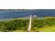 An aerial view of the community dock on the lake and the pathway leading to it at 2789 Southland St, St Cloud, FL 34772