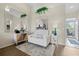 Bright living area with archway, stylish decor and open to the kitchen at 2808 Osprey Cove Pl # 201, Kissimmee, FL 34746