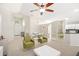 Bright living room featuring vaulted ceilings, an open layout, and stylish modern furnishings at 2884 Picadilly Cir, Kissimmee, FL 34747
