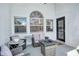 Cozy patio area with comfortable seating, fire table and nice windows at 2884 Picadilly Cir, Kissimmee, FL 34747