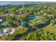 Aerial shot of community park, highlighting tennis courts, walking paths, and scenic waterfront views at 2926 Marquesas Ct, Windermere, FL 34786