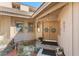 Charming front entrance with double doors, decorative wreaths, and a cozy bench at 2926 Marquesas Ct, Windermere, FL 34786