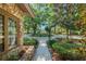 Beautifully landscaped front yard with stone accents and a walkway at 2926 Marquesas Ct, Windermere, FL 34786