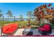Outdoor patio with comfortable seating and beautiful lake views for relaxing or entertaining at 2926 Marquesas Ct, Windermere, FL 34786
