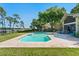 The pool with lakeside views, lush backyard, and an inviting outdoor space at 2926 Marquesas Ct, Windermere, FL 34786