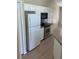 Well-lit kitchen featuring stainless steel appliances and ample counter space at 314 Casterton Cir, Davenport, FL 33897