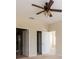 Bedroom with ceiling fan, closet and bath doors; ample space and modern conveniences make this a comfortable retreat at 3205 Sonesta Ct # F, Clermont, FL 34711