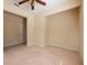 Carpeted bedroom with ceiling fan and natural light at 3205 Sonesta Ct # F, Clermont, FL 34711