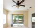 Cozy bedroom featuring sliding glass doors to a screened porch, offering the perfect blend of indoor and outdoor living at 3205 Sonesta Ct # F, Clermont, FL 34711